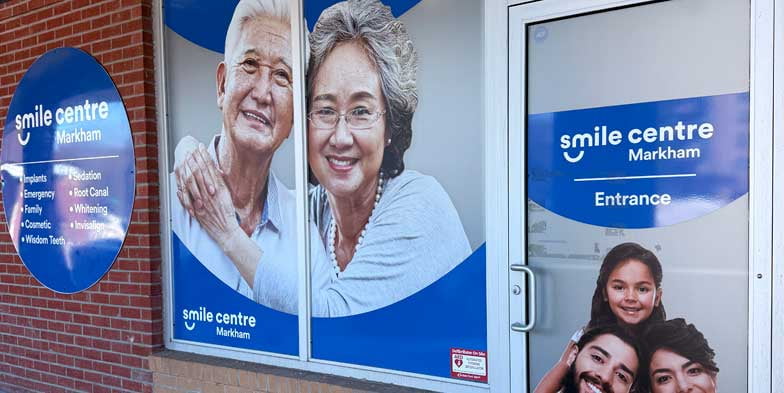 Markham Smile Centre clinic entrance with branded window signage